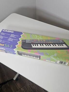 Casio SA-5 Kids Keyboard Piano - Black and White